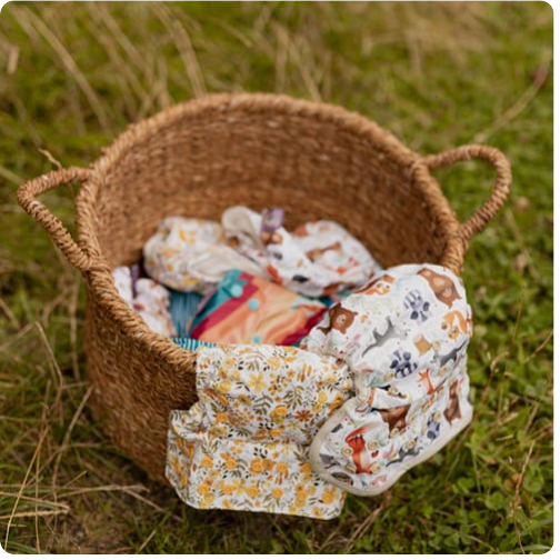 a basket of cloth nappies