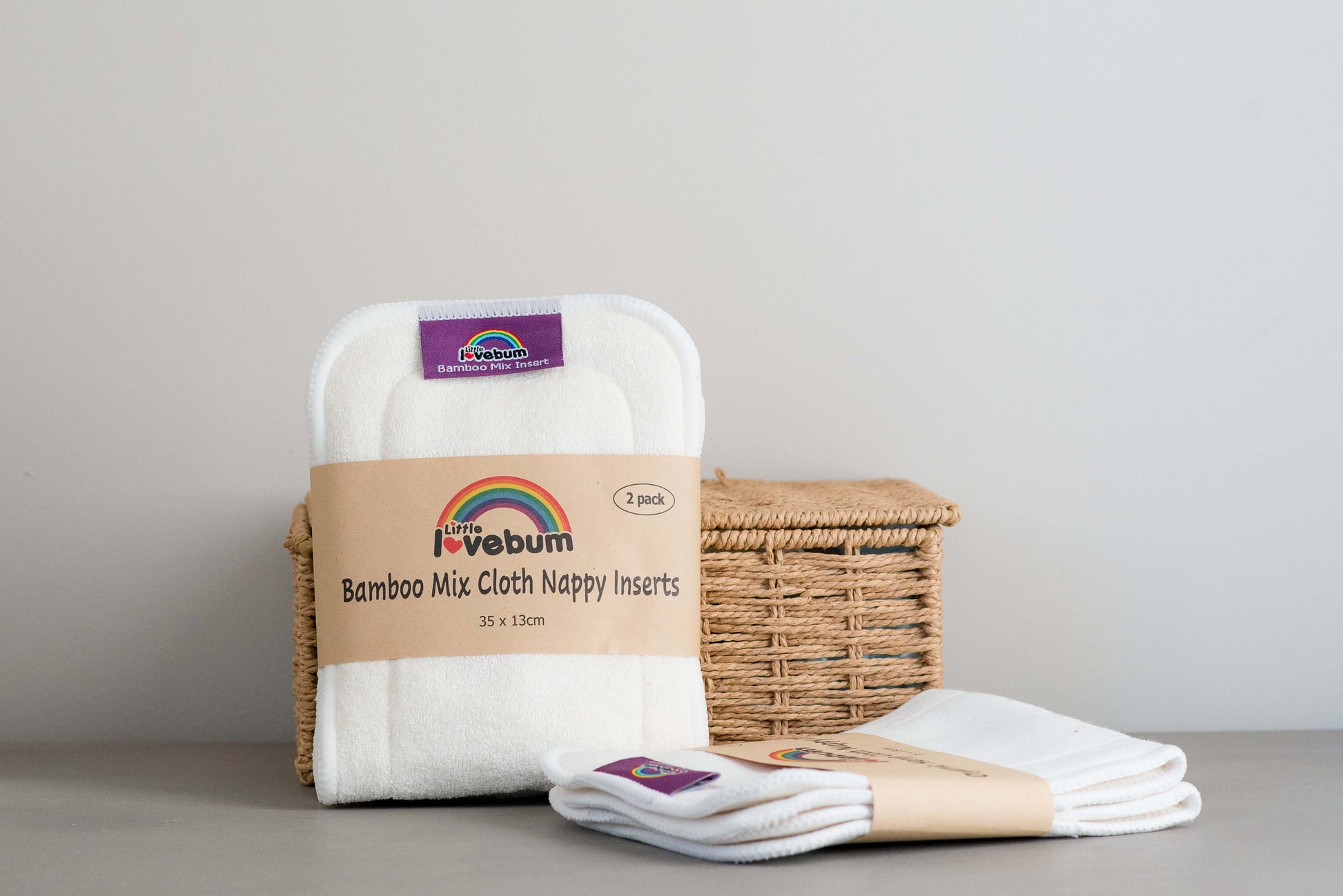Little Lovebum Cloth Nappy Bamboo Mix Insert - 2 pack Diapers Cloth Nappy near basket