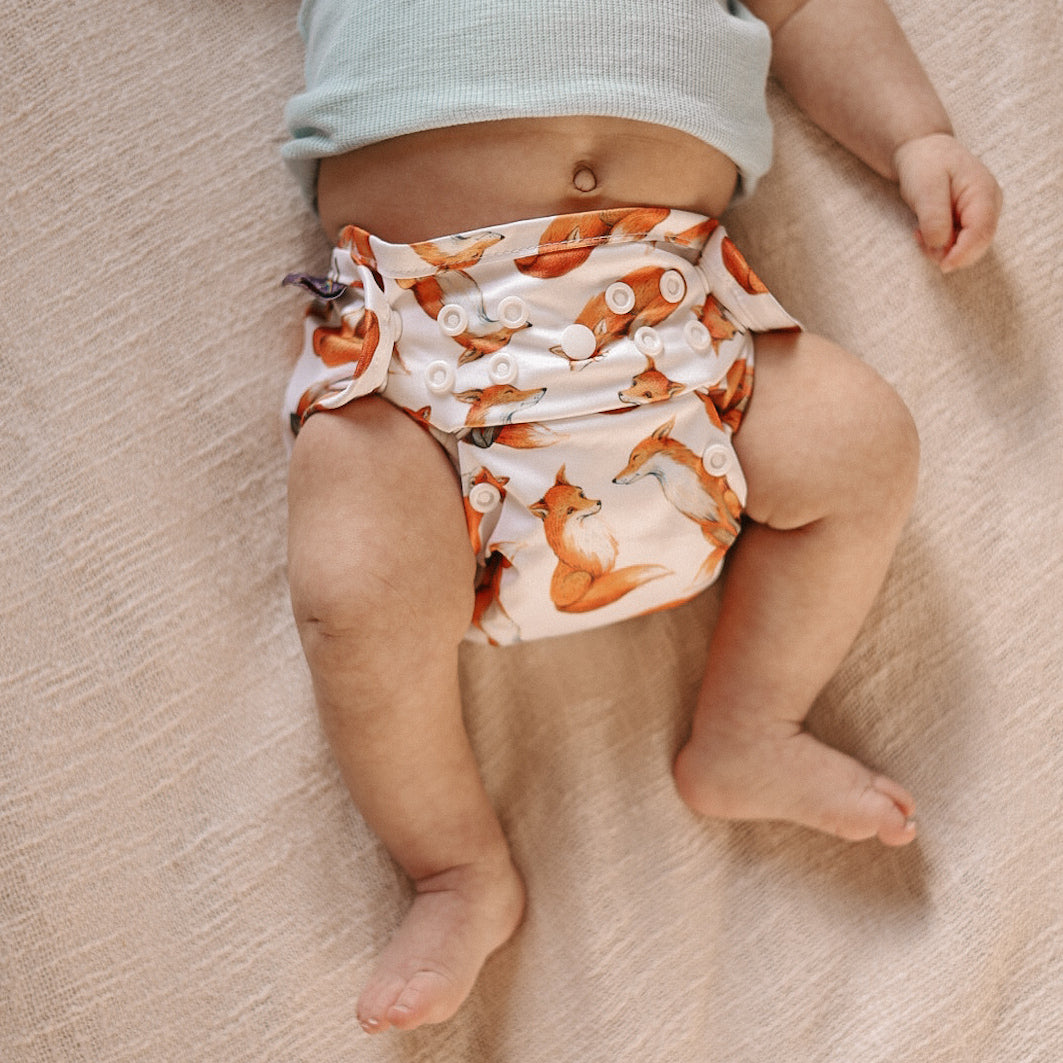 Newborn hot sale nappy wraps